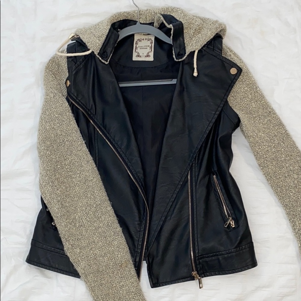 Leather jacket with cloth arms